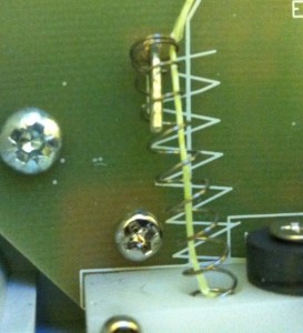 Refit the spring afterwards between the lever and the peg vsb-door-opener-5